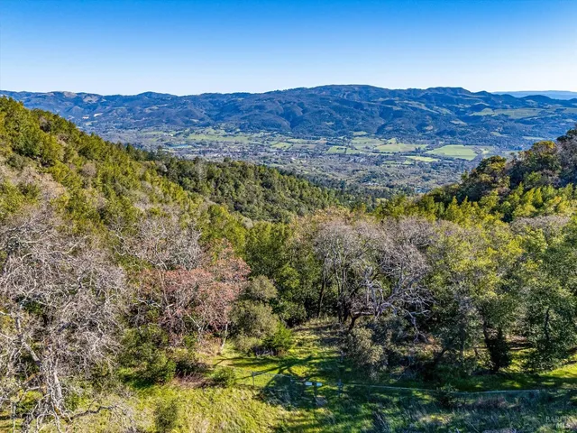 a view of mountain and a mountain