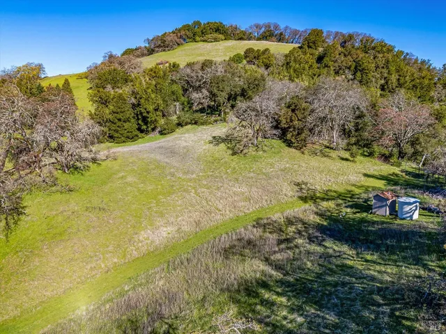 a view of a lake with a mountain in the background