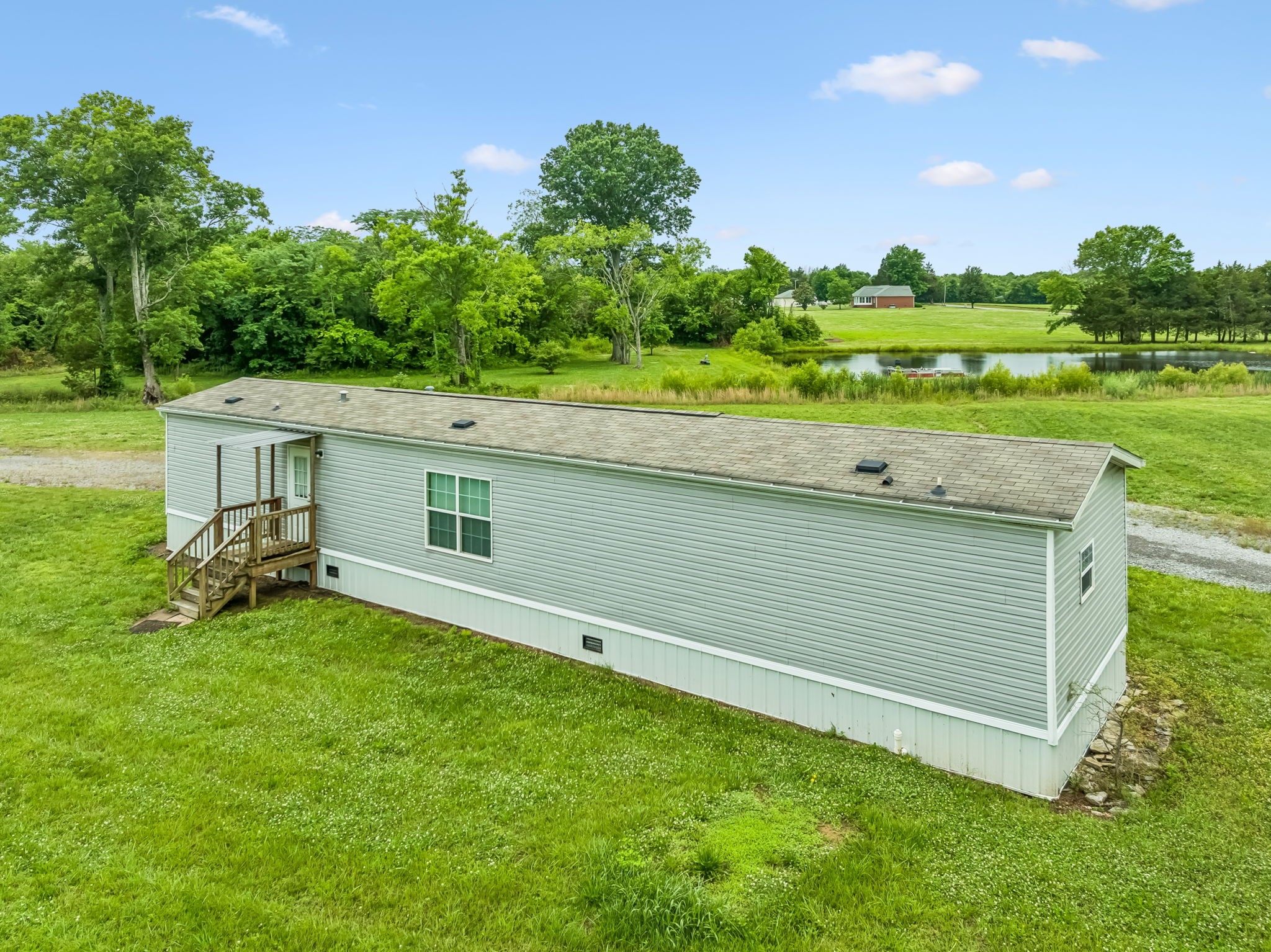 280 Kingdom Road Unionville, TN 37180 - Photo 21 of 65 a view of a backyard with plants and a garden