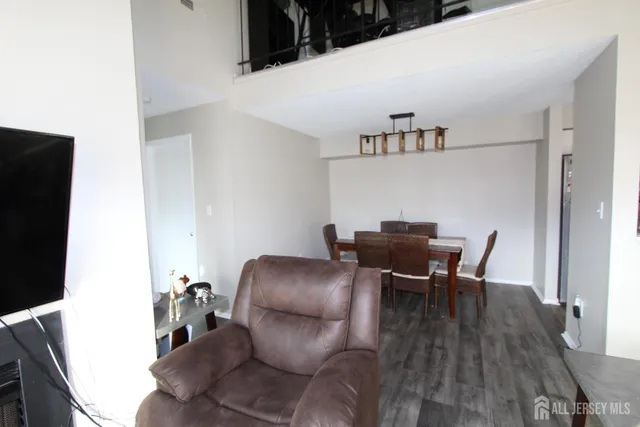 a workspace with furniture and wooden floor