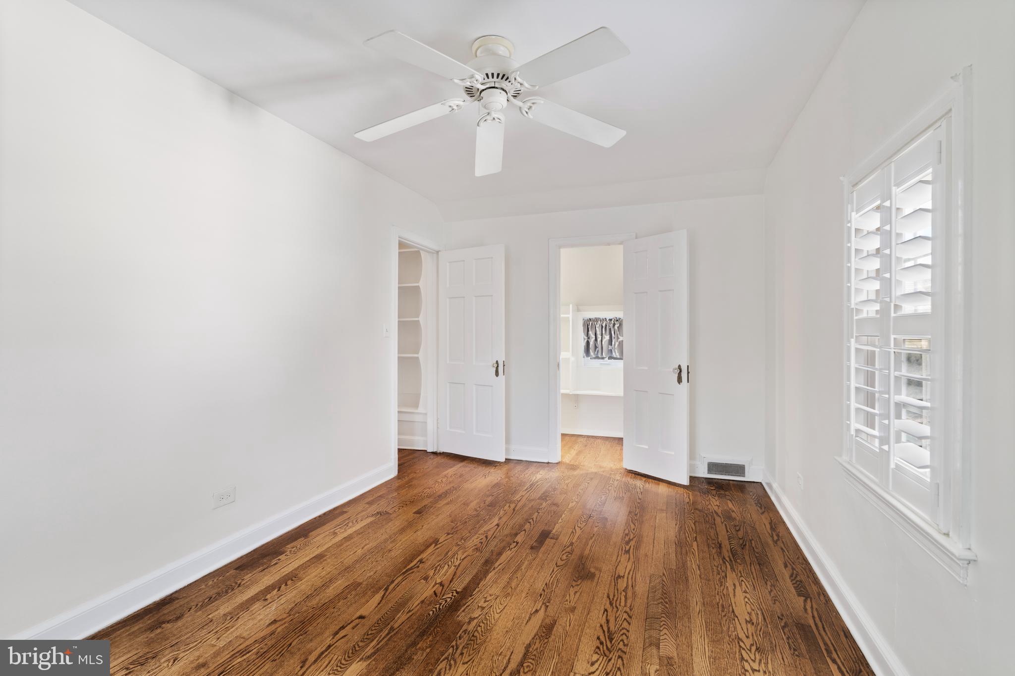 310 Worthington Road Baltimore, MD 21286 - Photo 26 of 50 wooden floor in an empty room with a window