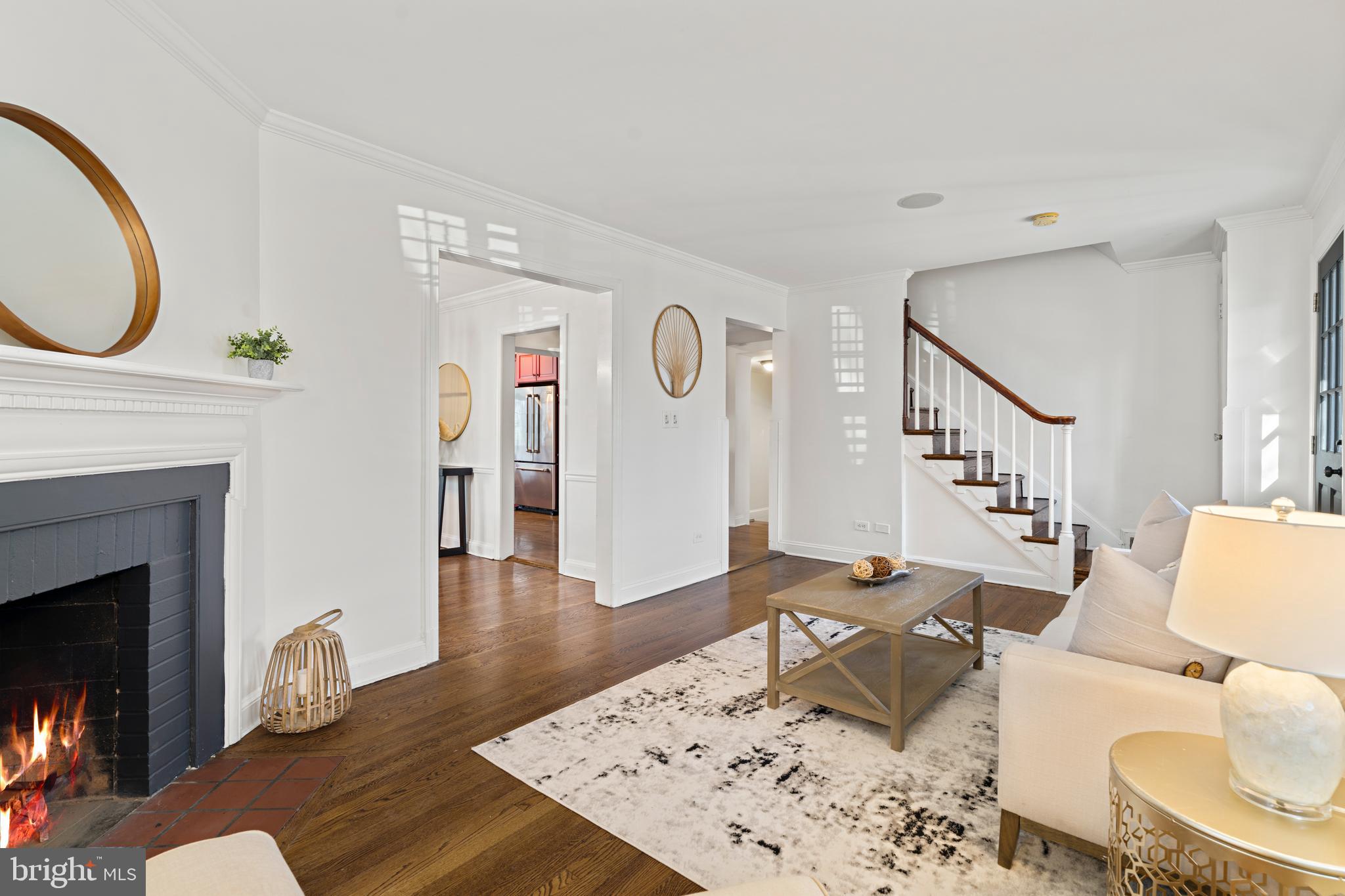 310 Worthington Road Baltimore, MD 21286 - Photo 5 of 50 a living room with furniture a rug and a fireplace