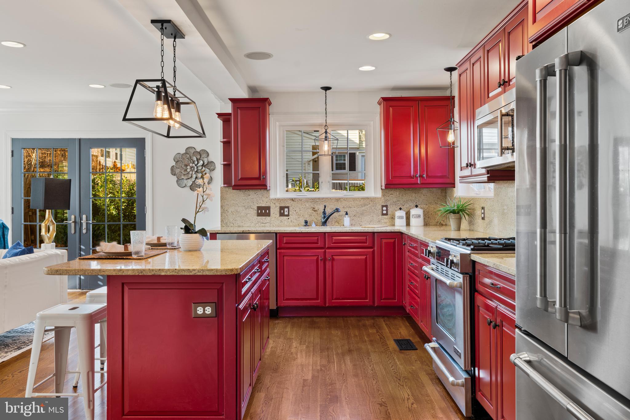 310 Worthington Road Baltimore, MD 21286 - Photo 9 of 50 a kitchen with stainless steel appliances granite countertop a stove a sink dishwasher and a refrigerator