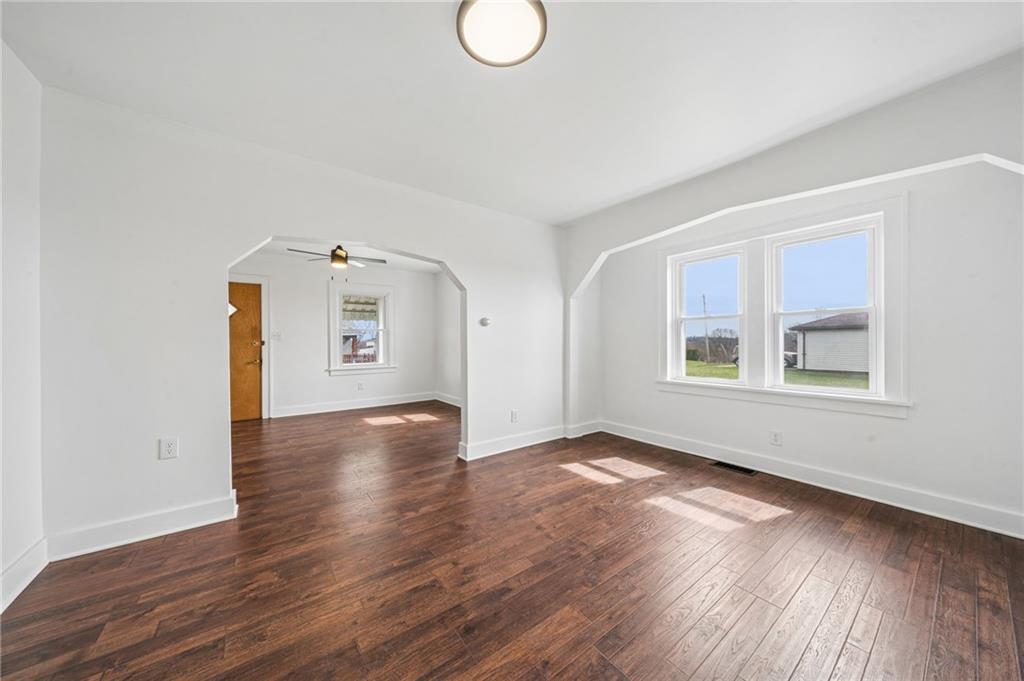 363 Oak Spring Road Canonsburg, PA 15317 - Photo 11 of 35 an empty room with wooden floor and windows
