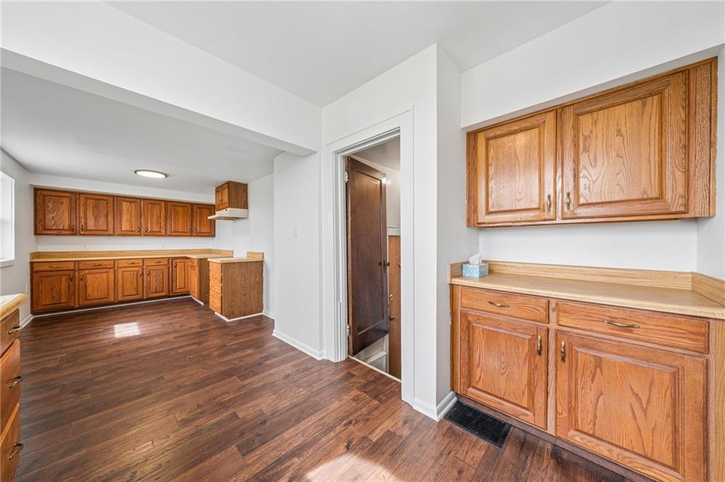 363 Oak Spring Road Canonsburg, PA 15317 - Photo 13 of 35 a view of an empty room with window and wooden floor