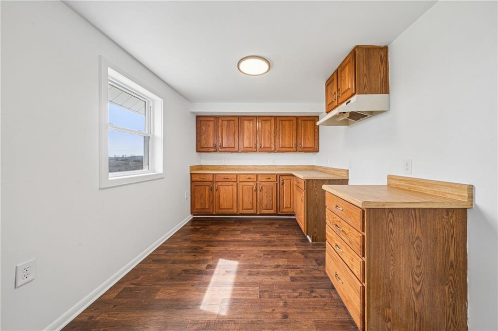 363 Oak Spring Road Canonsburg, PA 15317 - Photo 16 of 35 a view of a kitchen with furniture and wooden floor