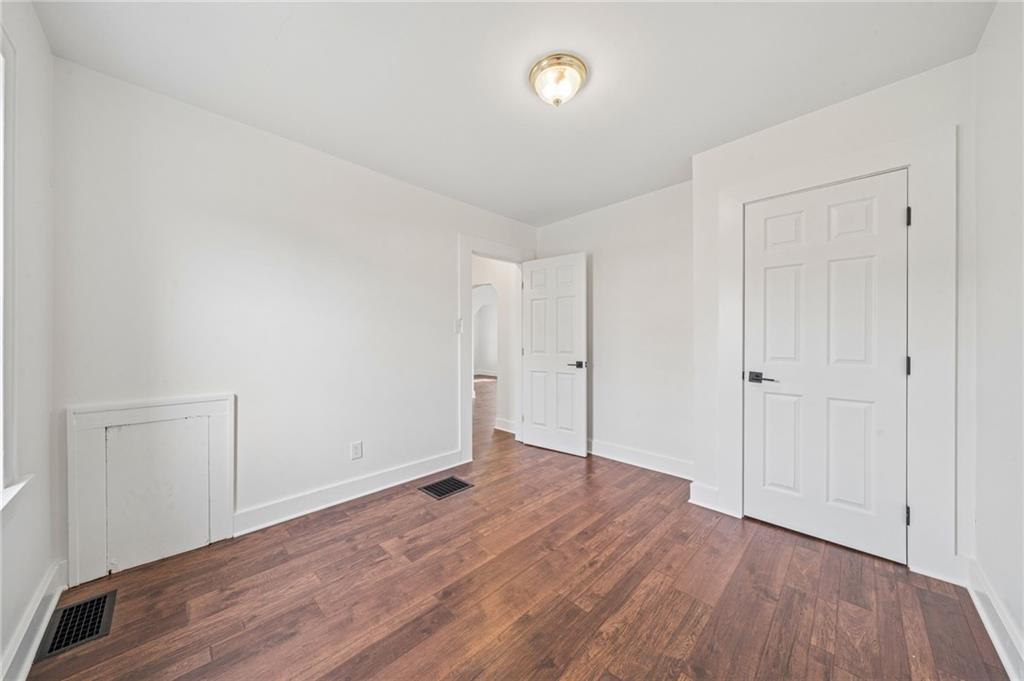 363 Oak Spring Road Canonsburg, PA 15317 - Photo 20 of 35 a view of an empty room with wooden floor