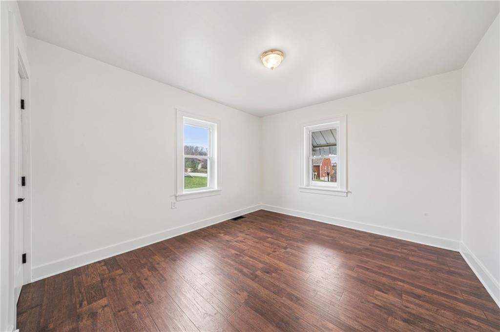 363 Oak Spring Road Canonsburg, PA 15317 - Photo 22 of 35 an empty room with wooden floor and windows