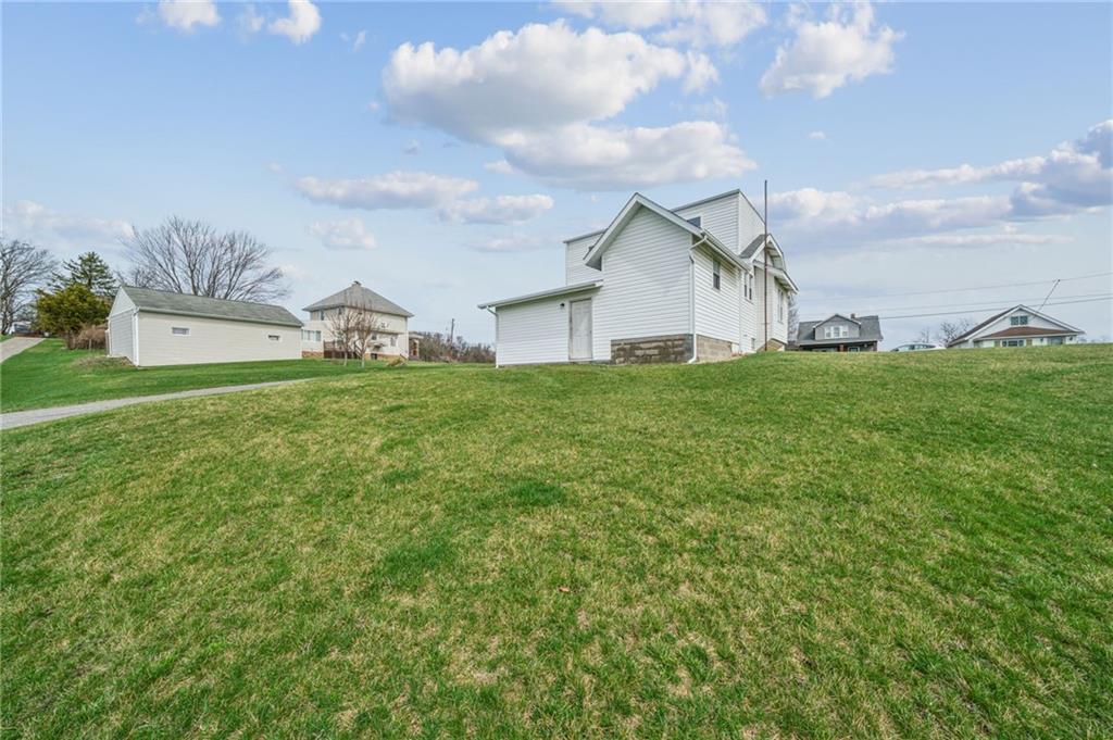 363 Oak Spring Road Canonsburg, PA 15317 - Photo 32 of 35 a house with huge green field in front of it
