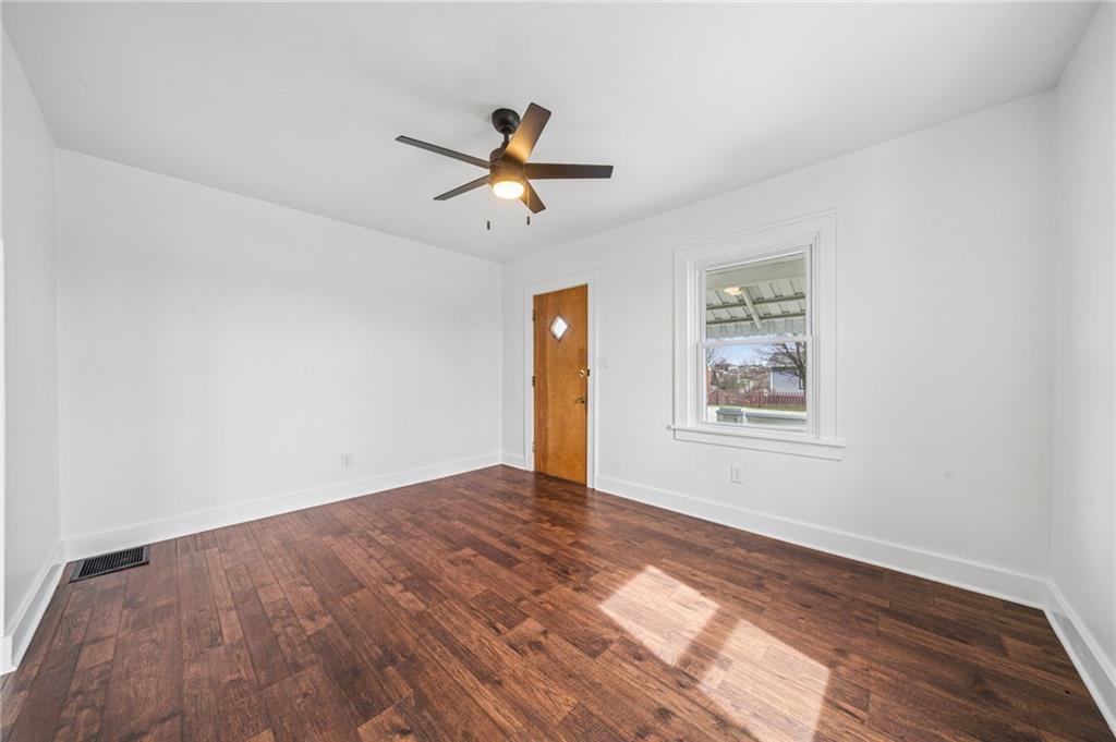 363 Oak Spring Road Canonsburg, PA 15317 - Photo 9 of 35 a view of empty room with wooden floor and fan