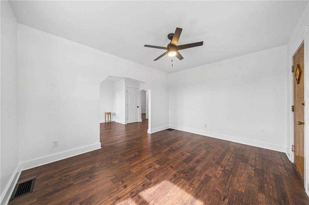 363 Oak Spring Road Canonsburg, PA 15317 - Photo 10 of 35 a view of empty room with wooden floor and ceiling fan