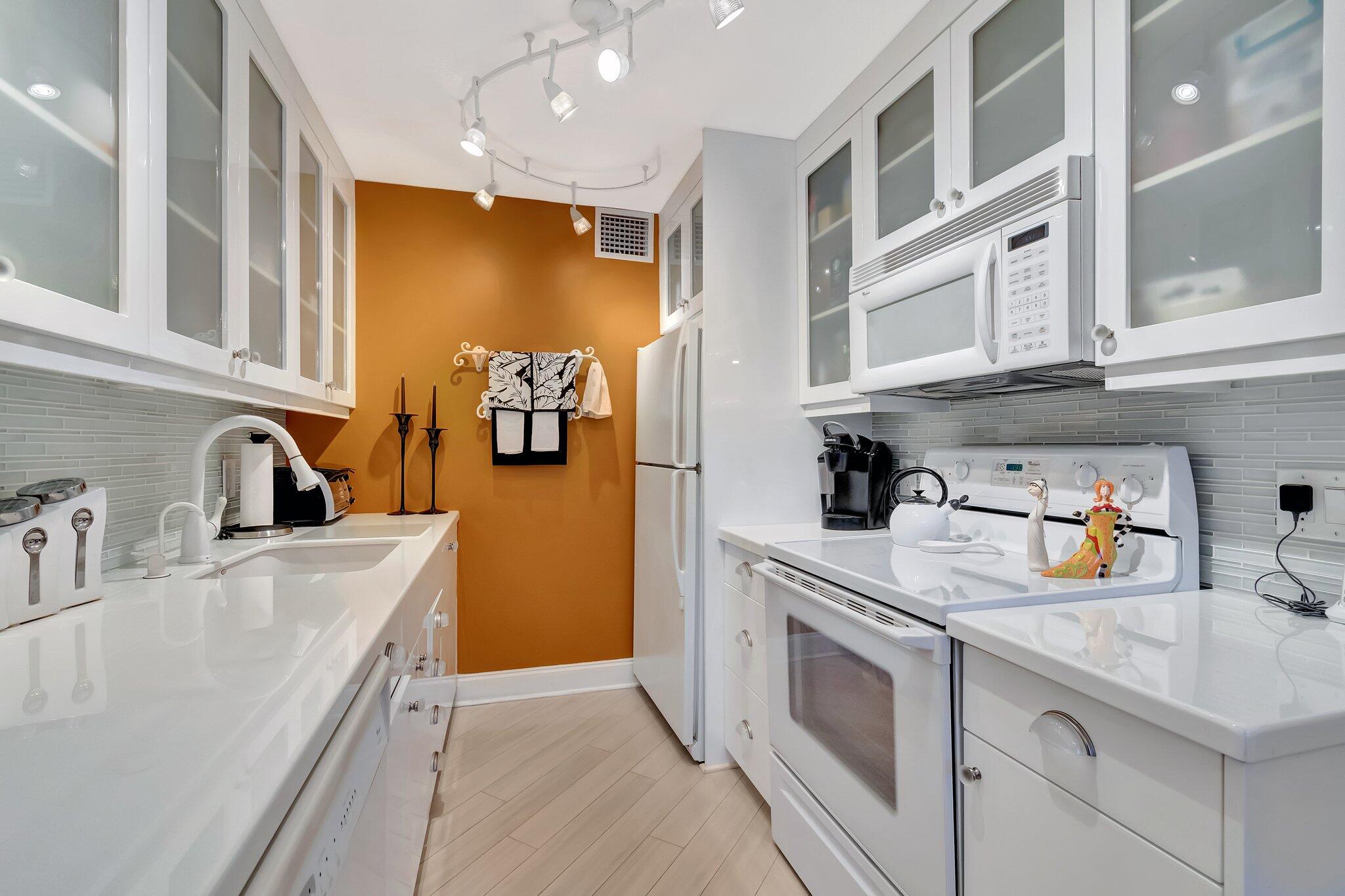 2026 Cornwall East Boca Raton, FL 33434 - Photo 1 of 82 a kitchen with stainless steel appliances granite countertop a sink dishwasher stove and refrigerator