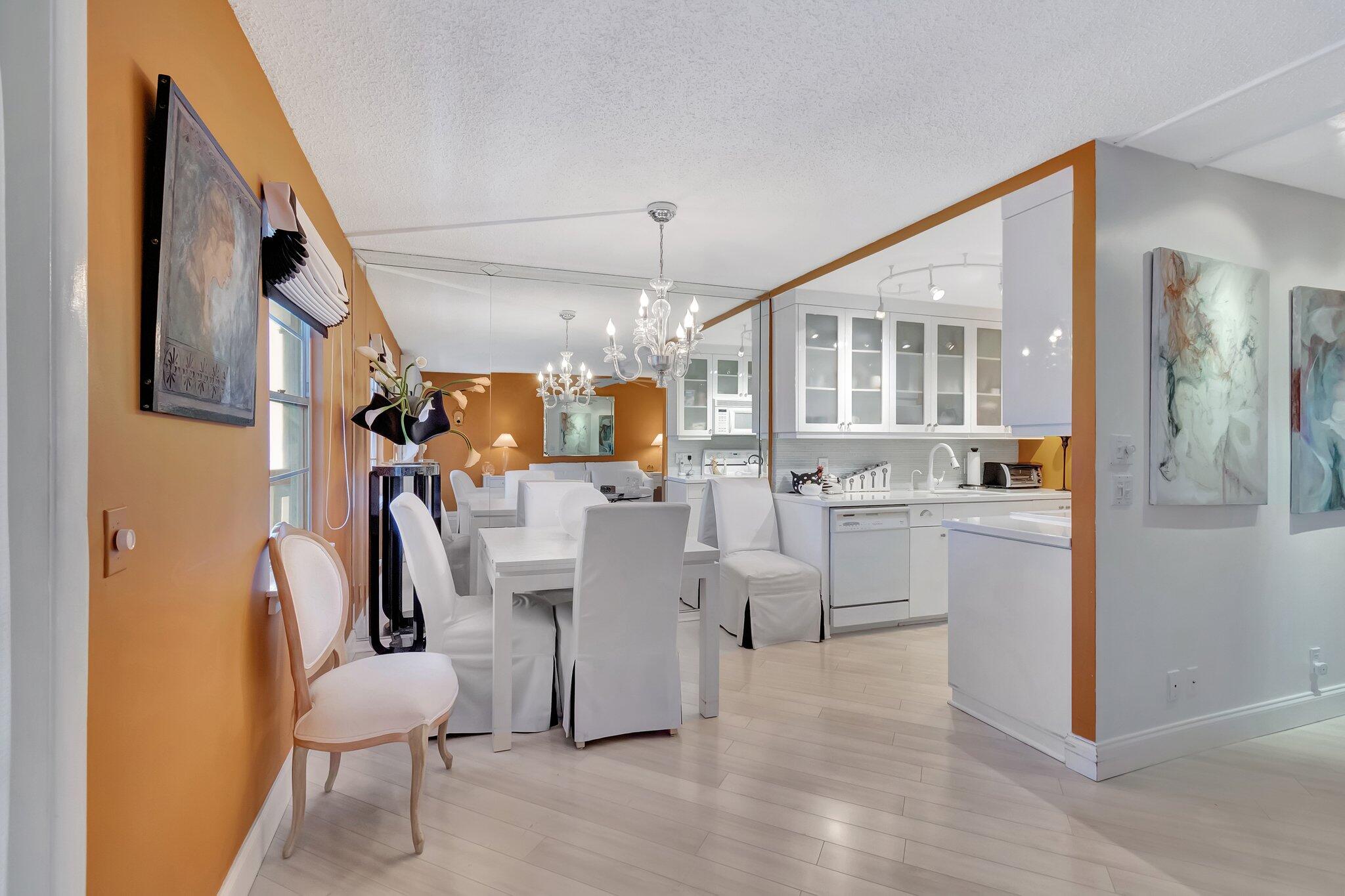 2026 Cornwall East Boca Raton, FL 33434 - Photo 17 of 82 a living room with furniture and a kitchen view