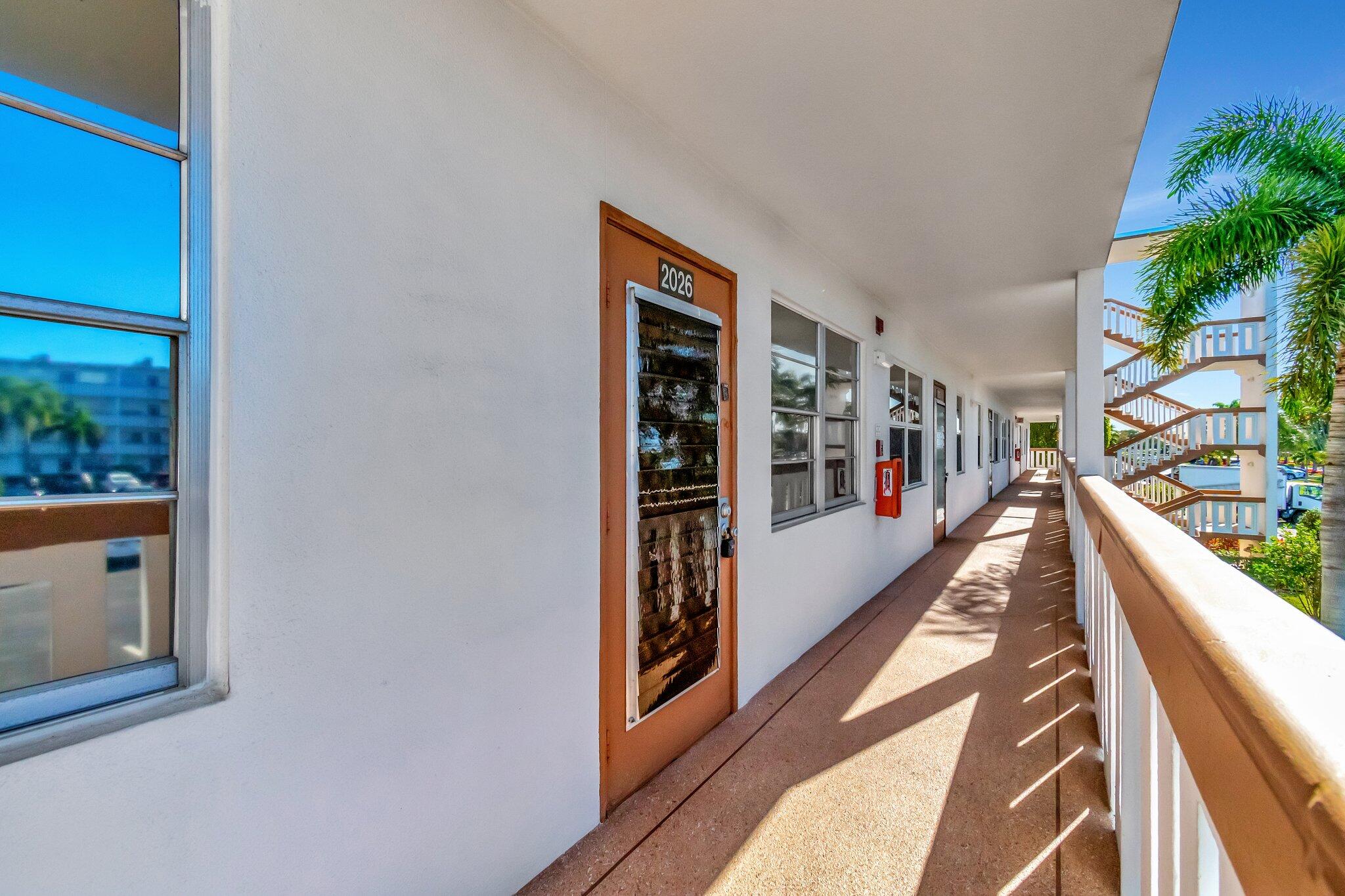 2026 Cornwall East Boca Raton, FL 33434 - Photo 8 of 82 a view of gallery with wooden floor