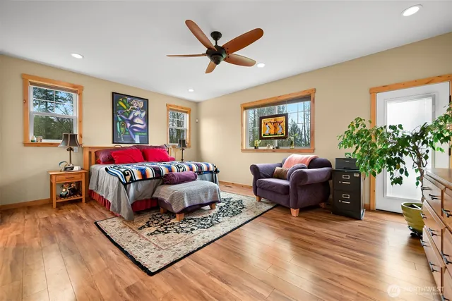 a living room with furniture rug and window