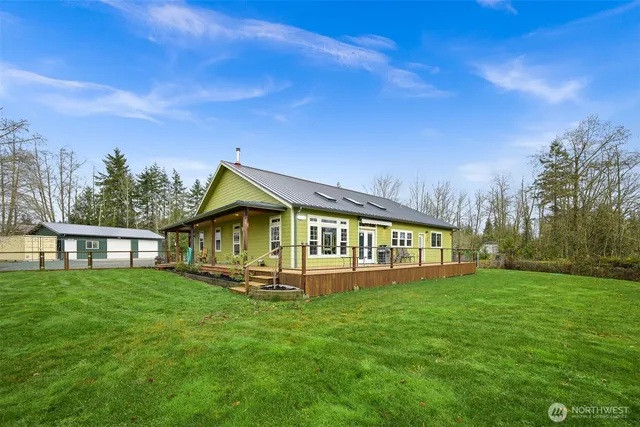 a view of a house with a big yard