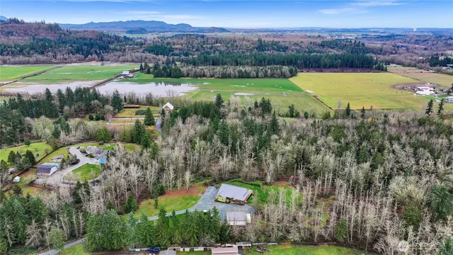 an aerial view of a house with a garden