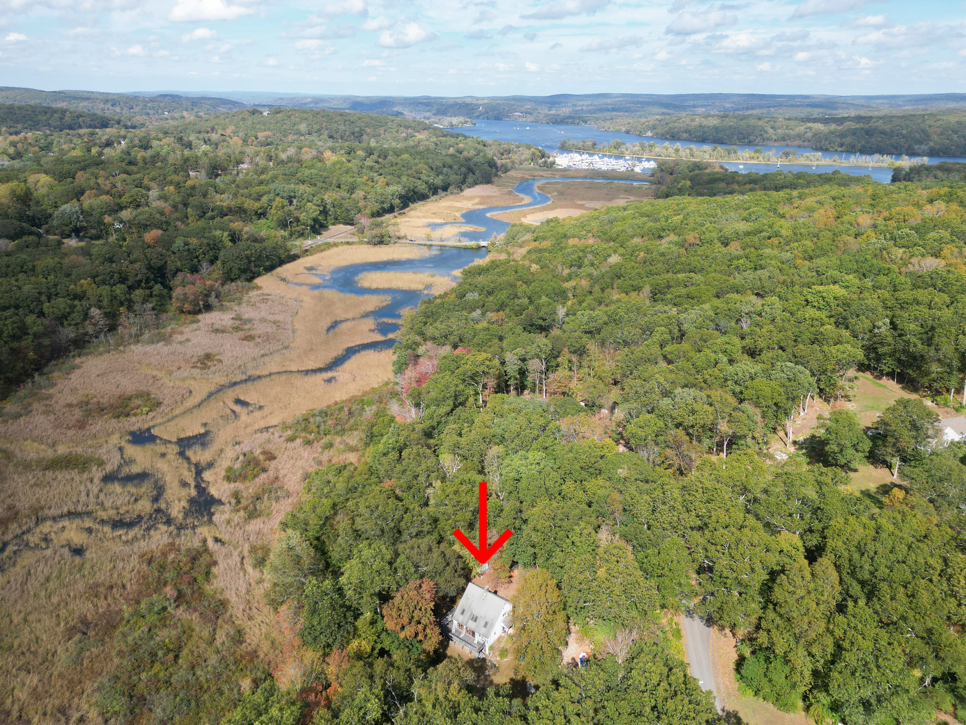 a aerial view of residential houses with outdoor space