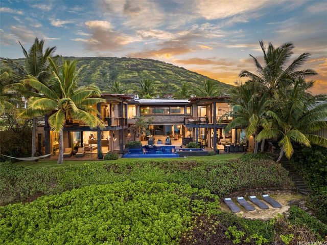 a view of a house with a garden