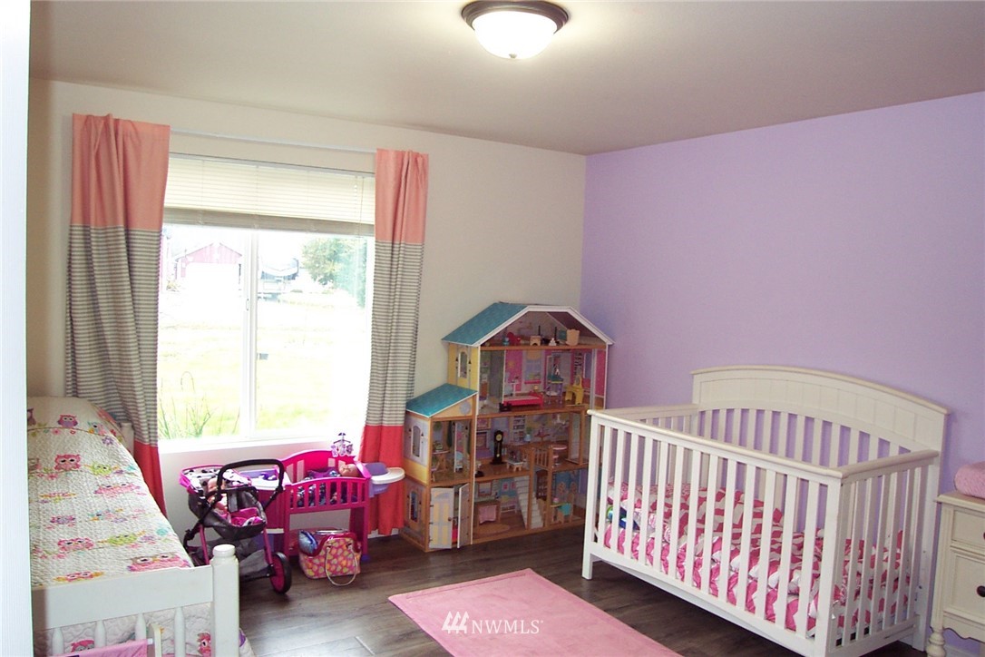 9222 176th Avenue Southwest Rochester, WA 98579 - Photo 15 of 21 a bedroom with furniture and a window