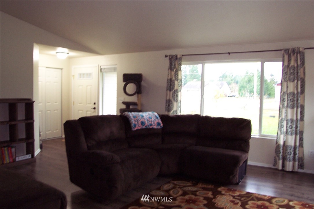 9222 176th Avenue Southwest Rochester, WA 98579 - Photo 5 of 21 a living room with furniture and a large window