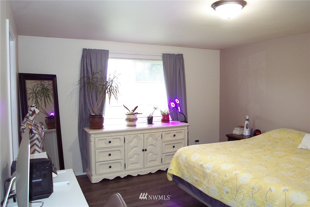 9222 176th Avenue Southwest Rochester, WA 98579 - Photo 10 of 21 a bedroom with a bed and a dresser