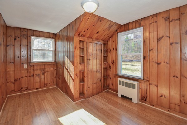 56 Bryant Road Holden, MA 01522 - Photo 17 of 24 a view of an entryway with wooden floor and door