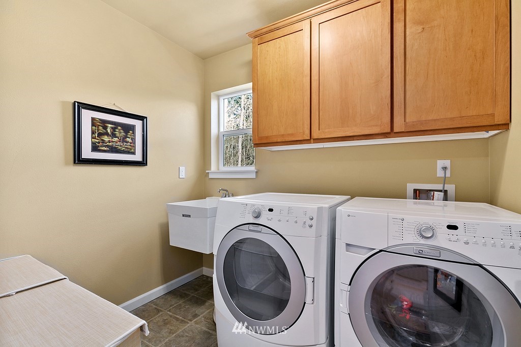 16204 40th Avenue Southeast Bothell, WA 98012 - Photo 20 of 24 a utility room with dryer and washer
