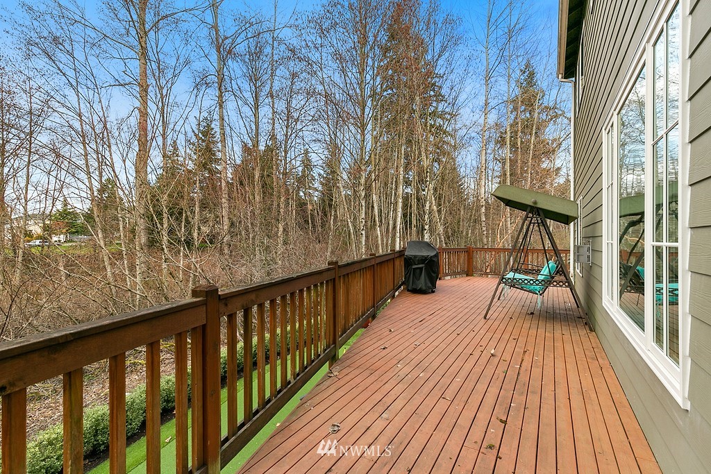16204 40th Avenue Southeast Bothell, WA 98012 - Photo 21 of 24 a view of balcony with wooden floor and bench