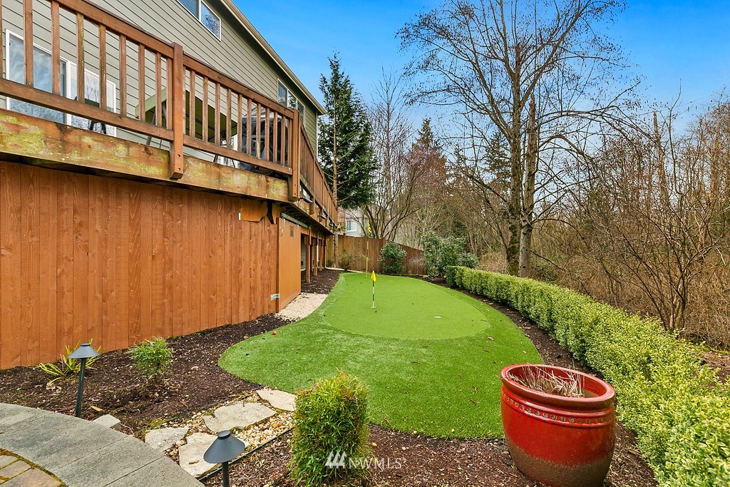 16204 40th Avenue Southeast Bothell, WA 98012 - Photo 22 of 24 a backyard of a house with yard and outdoor seating