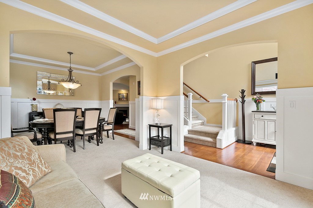 16204 40th Avenue Southeast Bothell, WA 98012 - Photo 3 of 24 a living room with furniture and a chandelier