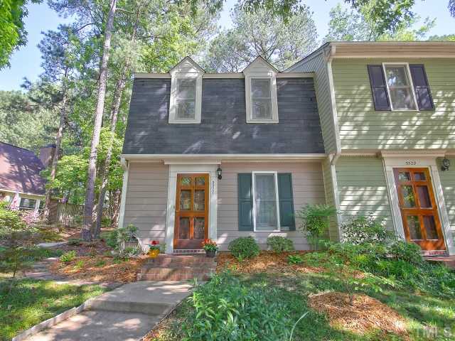 5527 Hamstead Crossing Raleigh, NC 27612 - Photo 1 of 5 a front view of a house with garden