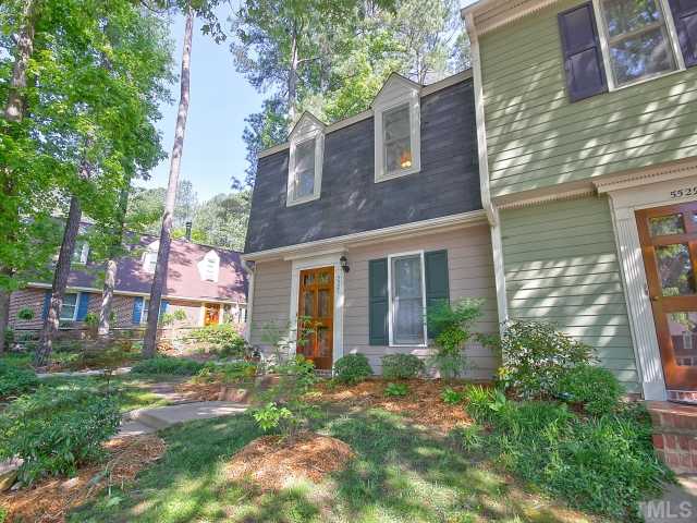 5527 Hamstead Crossing Raleigh, NC 27612 - Photo 2 of 5 front view of a brick house with a yard