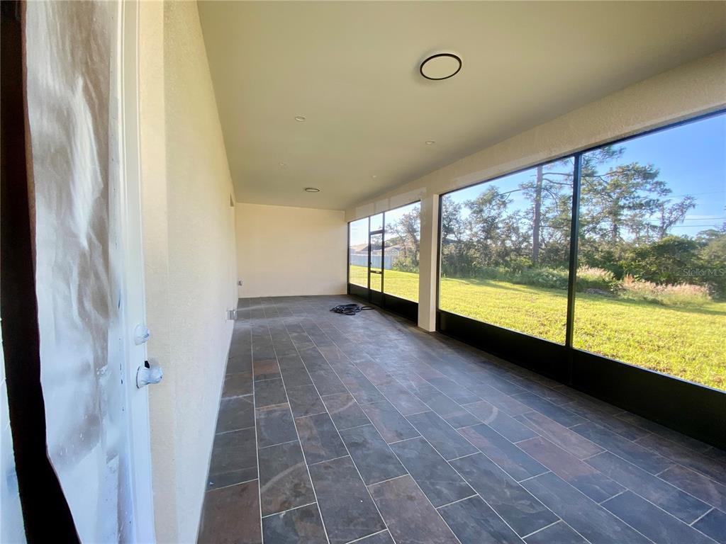 4449 Schumacher Road Sebring, FL 33872 - Photo 31 of 32 a view of an empty room and window