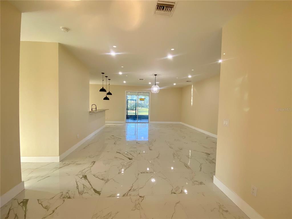 4449 Schumacher Road Sebring, FL 33872 - Photo 7 of 32 a view of a hallway