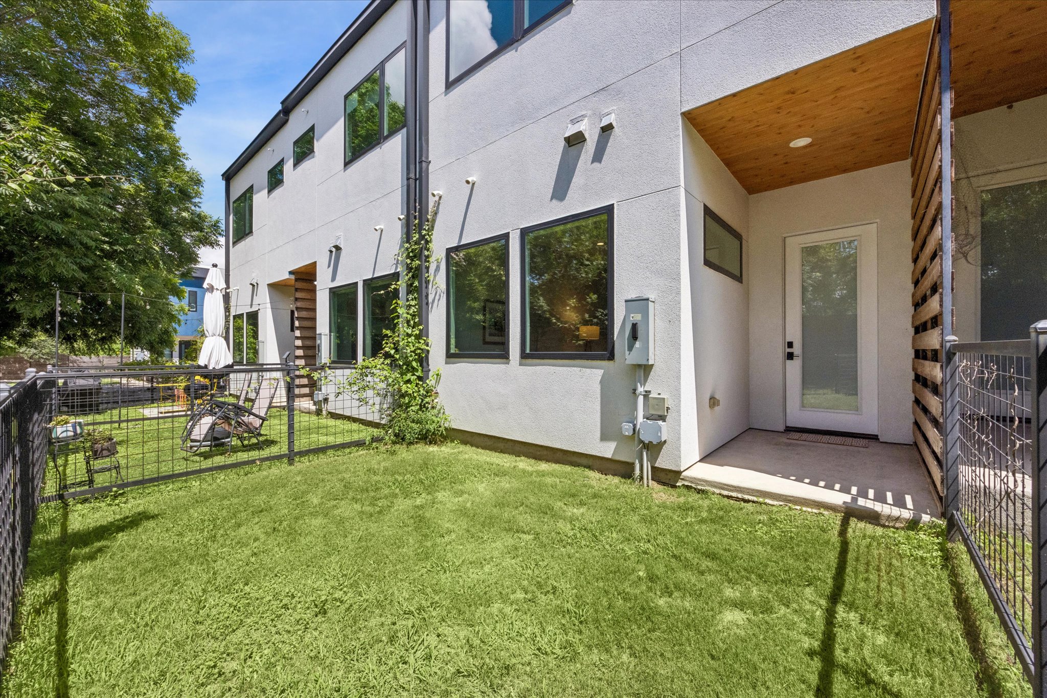 2108 Tillery Street, Unit 9 Austin, TX 78723 - Photo 21 of 25 Private fenced yard with covered patio