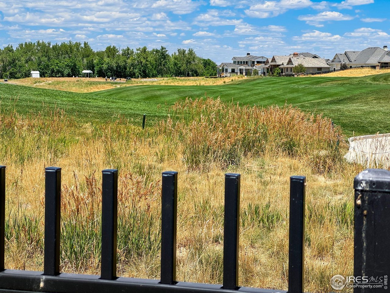 2824 Southwind Road Berthoud, CO 80513 - Photo 5 of 19 View from back of lot looking down hole 10