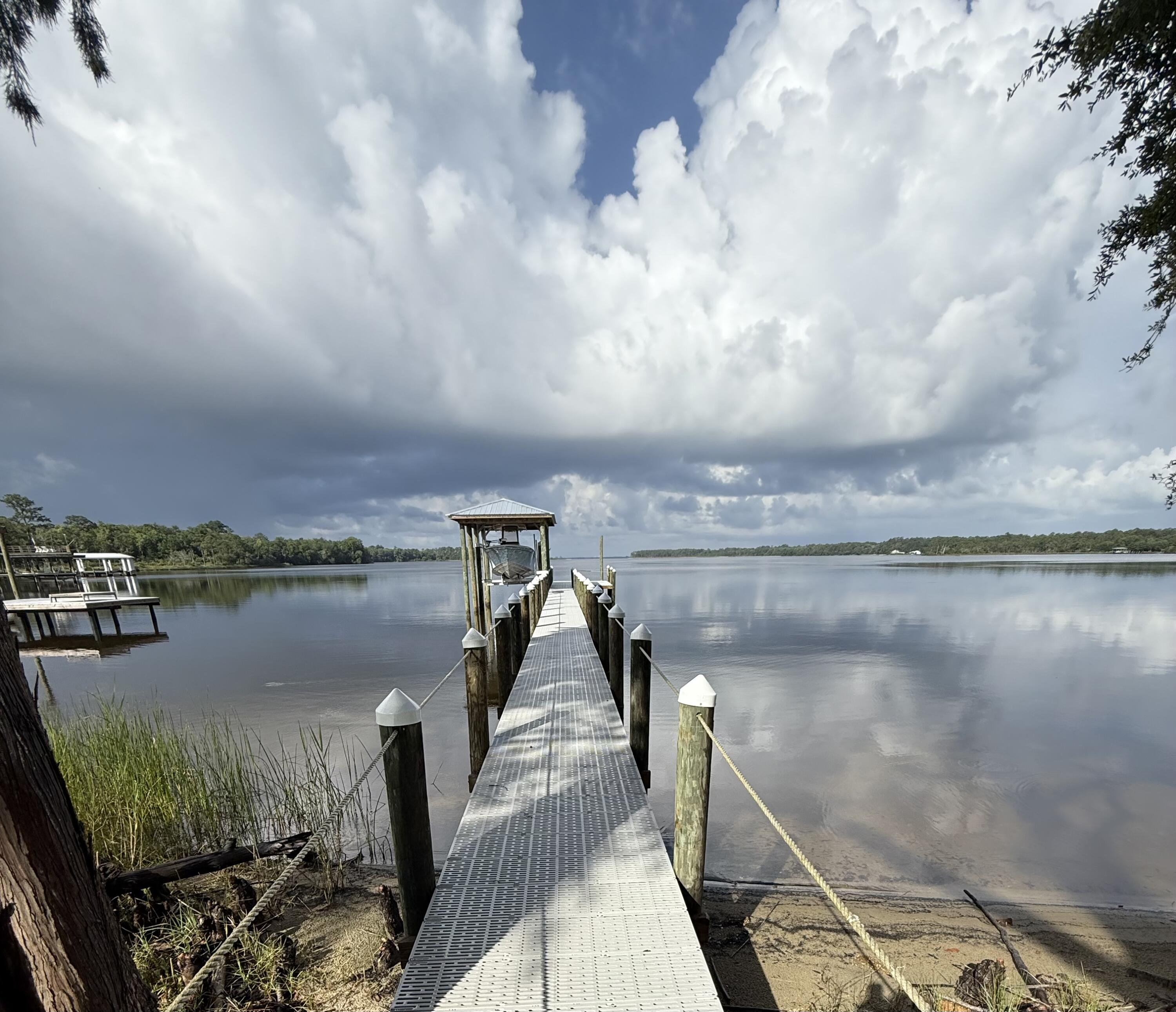 24 Waterview Place Freeport, FL 32439 - Photo 7 of 53 108' dock with ThruFlow decking