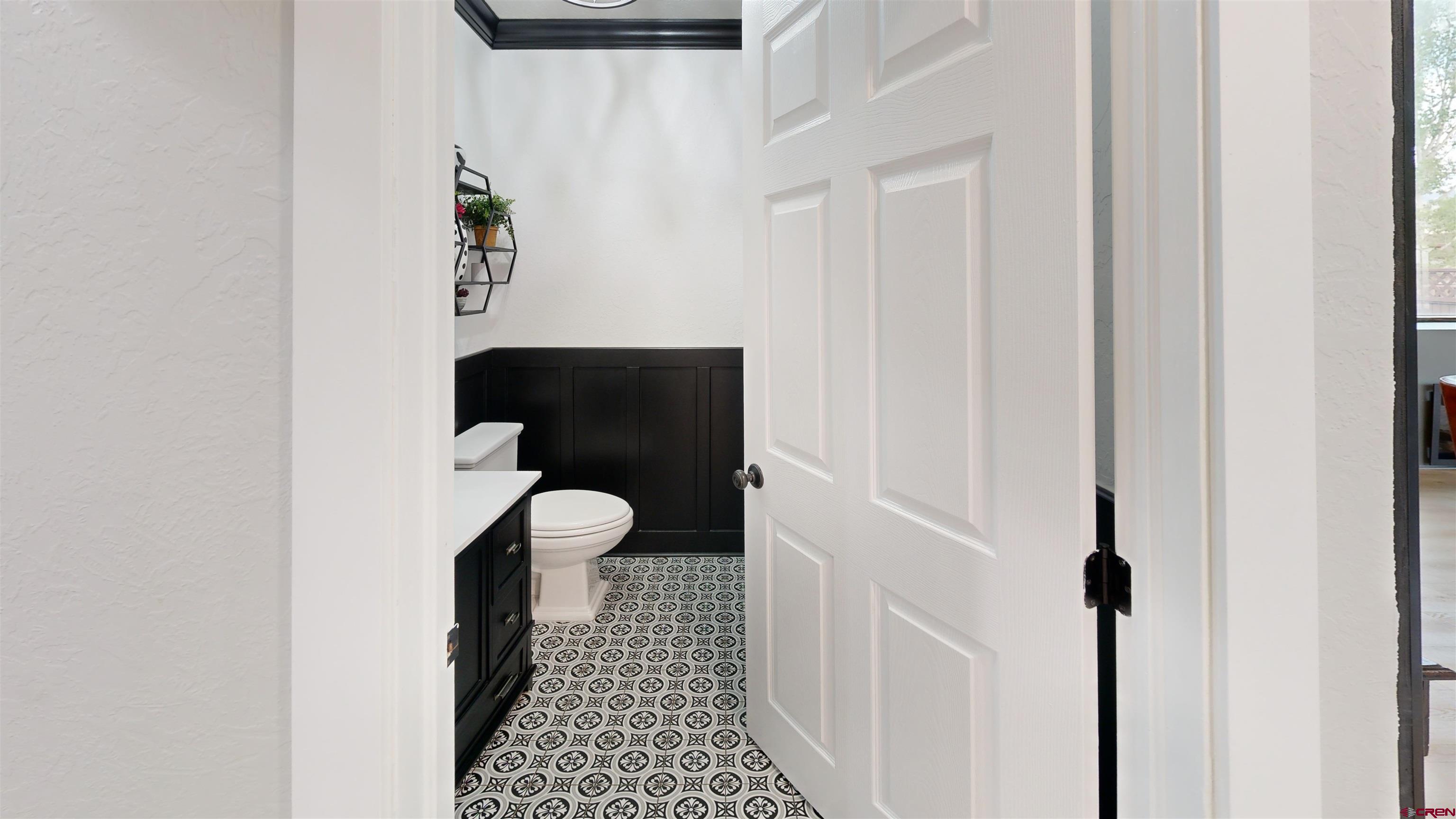 602 Chipeta Drive Ridgway, CO 81432 - Photo 10 of 41 a bathroom with a toilet and a shower