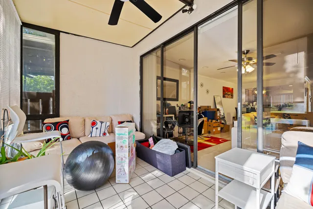 a room with furniture and gym equipment