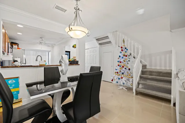 a view of a dining room with furniture