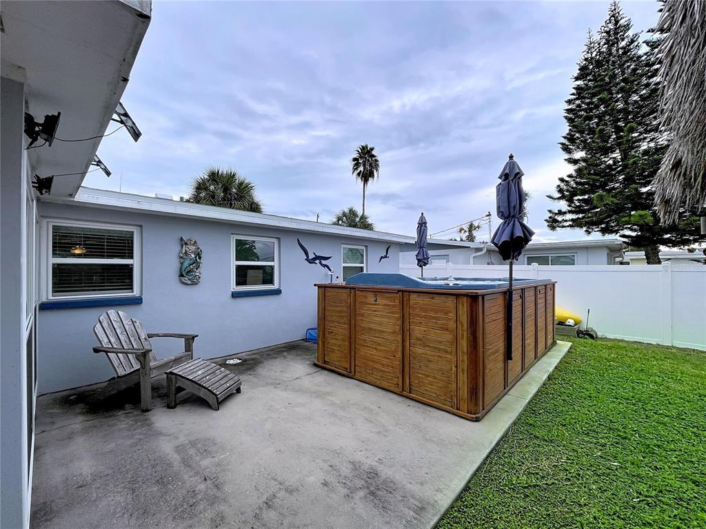 13429 Lisa Drive Hudson, FL 34667 - Photo 14 of 26 a view of a backyard with a sitting area