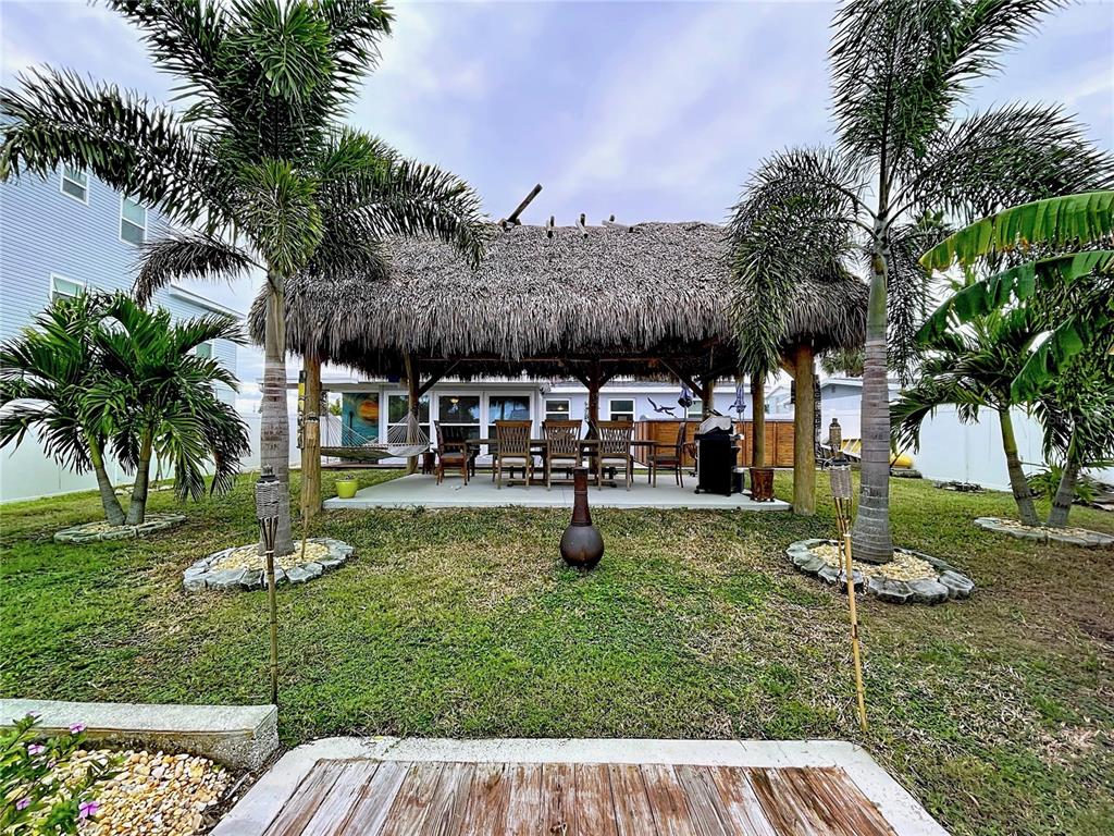 13429 Lisa Drive Hudson, FL 34667 - Photo 16 of 26 a view of a garden with a slide