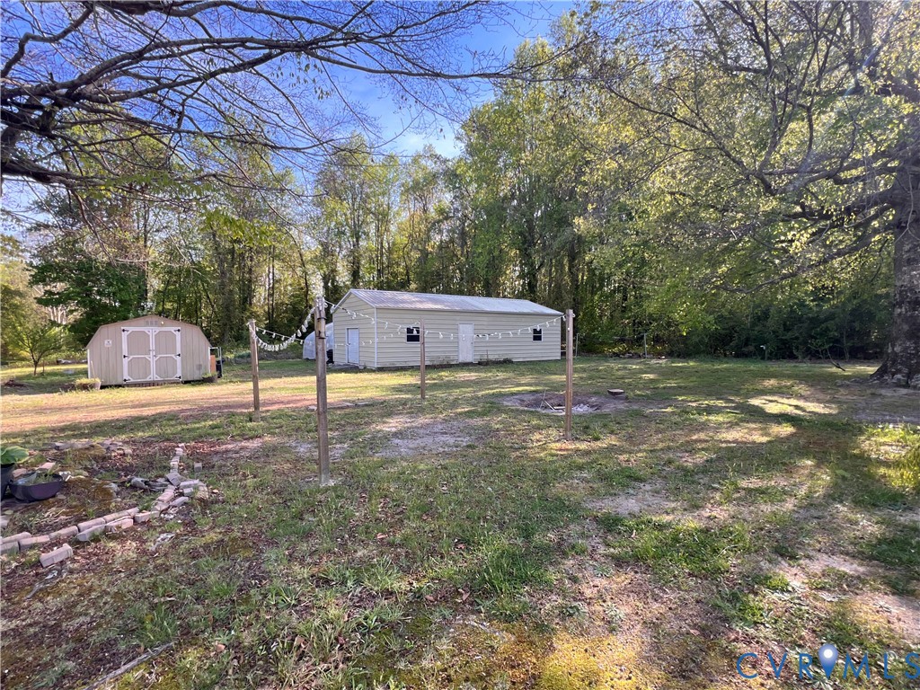 36210 Owens Grove Road Waverly, VA 23890 - Photo 3 of 24 a view of a outdoor space and basketball court