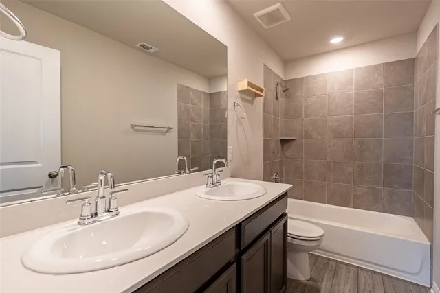 a view of a house with swimming pool and a yard