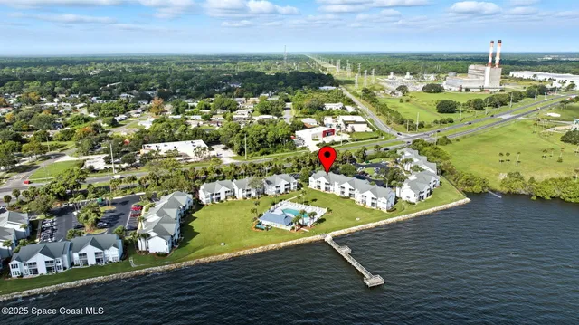 a view of a yard with an outdoor seating
