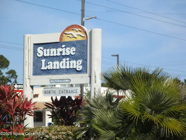 a view of a water fountain and an ocean view