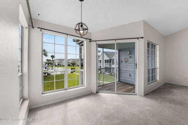 a view of livingroom with furniture wooden floor and window