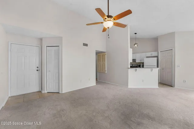 a view of a kitchen with a sink