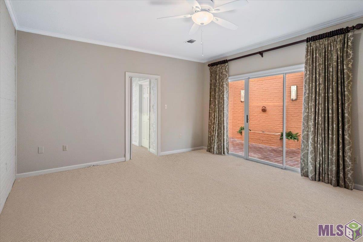 14 Jamestowne Court Baton Rouge, LA 70809 - Photo 12 of 23 Master Bedroom to Interior Courtyard